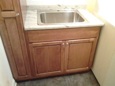 Laundry Room Broom Closet Maple Cherry Stain Vanity Sink Clothe Rack Rod Cabinet Cabinets Storage